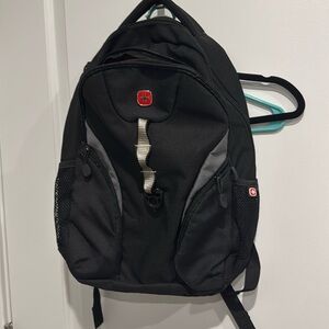 SWISS GEAR BACKPACK with laptop compartment NWOT black with red interior unisex